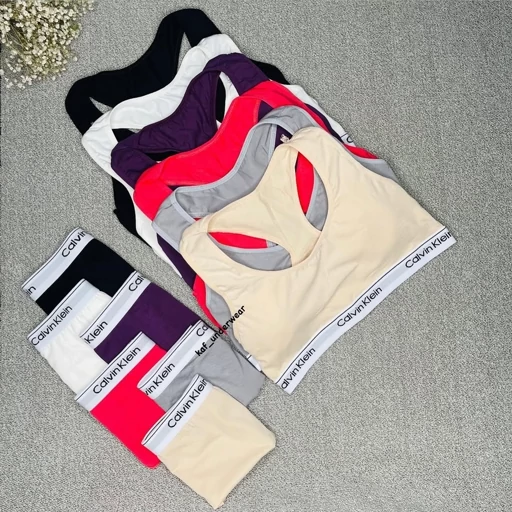 DMfGrvVm0PKu6iVcOhqxX3jhruKeenoKKmuPwJoKLFUukvscXI.jpg_512X512X70 ست نیم تنه و شورت کلوین CalvinKlein کاپدار در رنگهای متنوع - تصویر 1